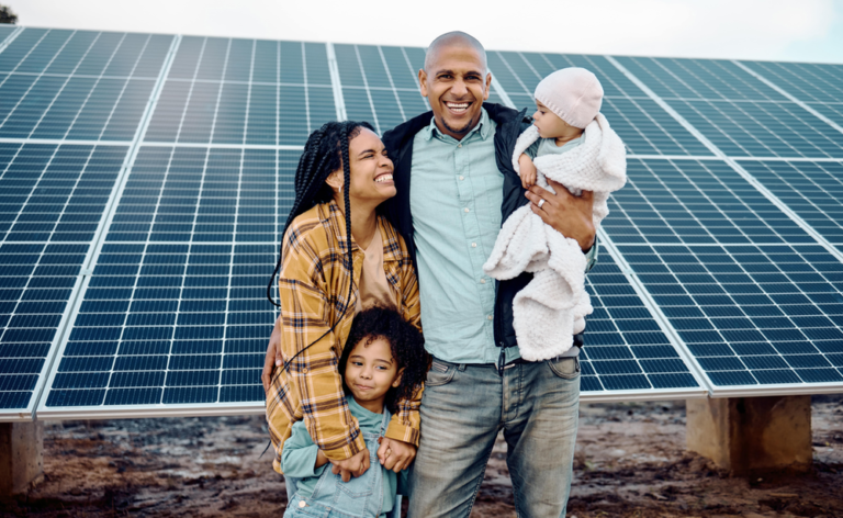 A family happy about joining community solar with Solar Gardens and savings money on electricity in the summer